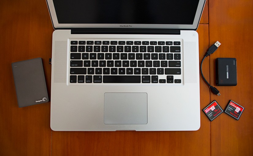 Backup tools: MacBook Pro (C); Seagate Backup Plus 2 TB Portable Drive (L); 2 SSK All-in-1 Card Reader plus USB cable and SanDisk 16 GB memory cards (R).